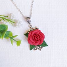 Red flower necklace pendant - Red rose necklace - Polymer clay necklace - Gift for her Description: material - polymer clay fimo, metal base, waxed lace. Size - length 17 inches, diameter of the pendant - 1.57 * 1.18 inches. Care - respectful, waterproof. Delicate necklace with  rose. The rose is made by hand. Perfect jewelry for the bride. Gift for mothers day. Christmas present. If you have any questions, write to me. Red Flower Necklace, Necklace Polymer Clay, Gift For Mothers Day, Polymer Clay Necklace, Necklace Red, Rose Necklace, Clay Necklace, Bride Gift, Red Flower