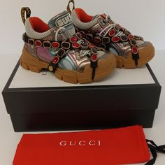 Gucci Women's 'Multicolor Metallic' Flashtrek Sneakers W/ Crystals - Eu36/Us6 Size - Eu36/Us6 Shipped With Usps Priority Mail. 100% Authentic, Brand New, Gucci Women's 'Multicolor Metallic' Flashtrek Sneakers W/ Crystals - Eu36/Us6 Brand New Never Worn Still In The Original Box. Purchased Directly From Gucci Original Price: $1725 Includes An Authentic Gucci Box, Cards, And Dustbags!!! This Is A Steal!!!.....Make An Offer!!!! Gucci Sneakers With Studded Rubber Outsoles, Gucci Multicolor Sneakers With Round Toe, Multicolor Gucci Leather Sneakers, Gucci Multicolor Lace-up Sneakers, Designer Gucci Sneakers With Laces, Luxury Multicolor Round Toe Sneakers, Luxury Multicolor Sneakers, Designer Gucci Sneakers, Gucci Pink Sneakers With Round Toe