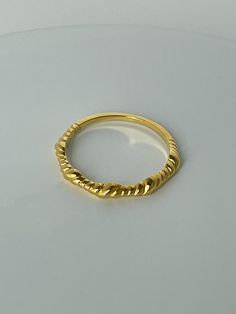 The Skinny Croissant Ring offers a slim, simple variation to the classic croissant ring. We love it as a pinky ring or stacked with our Mini Forever Pave Band. 18K gold plating on 925 sterling silver Water resistant, hypoallergenic Gold Plated Hoop Rings For Everyday, Croissant Ring, Silver Water, Baguette Ring, Pave Band, Pinky Ring, Gold Plating, 18k Gold, Gold Plate