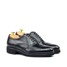 Also known as a wingtip, the Full Brogue is easily identifiable as one of the most classic pairs of men's dress shoes on the market. Featuring a brogue pattern along the sides as well as the toe cap, every man needs a Full Brogue in his shoe closet. Sole units (different available) are Blake stitched to uppers. Upper Materials: Black Box Calf Lining: Black Calf Leather Sole: Black Heeled Rubber Sole Last: Zurigo - Rounded Toe for Traditional English Look YOUR Package Includes Leather shoe cleani Jodhpur Boots, Men's Dress Shoes, Wood Shoes, Wingtip Oxford, Traditional English, Leather Box, Shoe Tree, Red Sole, Shoe Closet