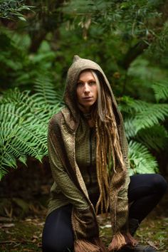 Enjoy soft Alpaca wooly warmth with our Earth Tribe Hoodie Scarf, featuring a large hood and pockets (optional). Hoodie Scarves go perfectly with summer outfits or hoodless jumpers for a laid back bohemian style.Washing instructions: the fabric is breathable so you can hang it up outside to air out instead of washing, or hand-wash with cold water. MEASUREMENTSLength : 162 cm / 63.9"Width : 18 cm / 7.08" Hand made with Love ❀ Green Hooded Hoodie For Outdoor, Hippie Hooded Hoodie For Fall, Green Hooded Jacket With Adjustable Hood, Green Long Sleeve Hooded Jacket With Adjustable Hood, Green Hooded Jacket With Kangaroo Pocket For Fall, Fall Festival Casual Hoodie, Casual Fall Festival Hoodie, Green Casual Festival Outerwear, Casual Green Festival Outerwear