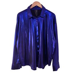 By Anthropologie The Gillian Liquid Shine Buttondown Shirt. Cobalt Blue With A Purple Undertone. Long Sleeve. Point Collar. Button Front Closure. Slightly Dropped Shoulder. Curved Hem. Pleated Yoke In Rear. 96% Polyester, 4% Elastane. Hand Wash Inside Out. Line Dry. New With Tag. Never Worn. Size: X-Large Measurements (Flat Across): Shoulders 23” Underarm To Underarm 26” Hem Sweep 26” Sleeve (Shoulder Seam To Cuff) 22.5” Length (Front, Top Of Shoulder To Hem) 27” Thanks For Shopping My Closet. B Anthropologie Top, Shoulder Sleeve, Cobalt Blue, Blue Purple, Blue And Purple, Inside Out, Anthropologie, Button Down Shirt, Top Blouse