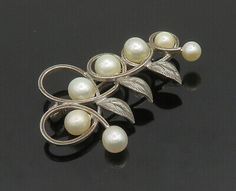 Jewelry Type: Brooch Pin. Stone Type: Pearls. Estate Style Silver Jewelry Gift, Estate Style Silver Jewelry For Gifts, Vintage Sterling Silver Brooches For Wedding, Vintage Sterling Silver Brooch For Wedding, Vintage Sterling Silver Wedding Brooches, Vintage White Gold Sterling Silver Brooches, Vintage Antique Silver Sterling Silver Brooches, Vintage Sterling Silver White Gold Brooches, Vintage Silver Brooch With Gemstone