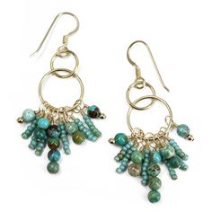 Add a touch of natural beauty and elegance to your outfit with these exquisite handmade dangle earrings. Featuring genuine turquoise beads in a stunning array of shades, these earrings are a perfect blend of style and sophistication. The turquoise beads are complemented by delicate glass seed beads and yellow gold filled findings, creating a captivating and eye-catching piece. Materials: Genuine turquoise beads, glass seed beads, yellow gold filled findings, gold filled ear wires Length:  About 2.25 Inches Handmade with Love: These earrings are crafted with attention to detail, ensuring a high-quality and unique piece. Perfect for Any Occasion: Whether you're dressing up for a special event or adding a touch of glamour to your everyday look, these earrings are the perfect accessory.    Not Elegant Turquoise Chandelier Earrings With Round Beads, Elegant Turquoise Chandelier Earrings, Bohemian Drop Earrings With Gemstone Beads, Turquoise Beaded Earrings With Natural Stones, Elegant Turquoise Beaded Dangling Earrings, Handmade Dangle Earrings, Bead Dangle Earrings, Turquoise And Gold, Cord Jewelry