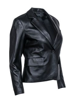 Slip into downtown darling status with this black lambskin leather blazer by Nili Lotan. You'll be the talk of the town in this versatile jacket, perfect for a night out or a day at the office. Perfect for happy hour hopping, pair with a boot heel and chic skirt for a stylish look. Size 4 Made in USA 100% Lambskin Leather Fully lined Single button front closure Notch lapel Bust 36" Waist 38" Shoulder to hem 21" Shoulder to shoulder 15" Sleeve length 22" Classic Formal Leather Jacket For Spring, Elegant Leather Jacket For Business Casual In Fall, Chic Leather Jacket For Formal Occasions, Elegant Fall Blazer With Leather Lining, Sleek Leather Jacket For Spring Formal, Fitted Single Breasted Leather Jacket For Night Out, Fitted Single-breasted Leather Jacket For Night Out, Chic Leather Blazer For Night Out, Luxury Leather Blazer For Night Out