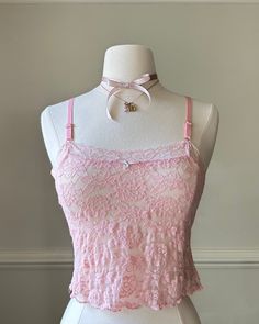 - Adorable sheer soft pink cropped camisole featuring rose lace embroidery fabric with square neckline- adjustable straps; bow adorned- size S- stunning condition with no visible damage or flaws 🤍 Size of mannequin: size 2 - 4 Lace Trim Lace Camisole Crop Top, Feminine Pink Lace Top With Lace Patchwork, Feminine Pink Lace Top With Patchwork, Feminine Lace Crop Top With Spaghetti Straps, Feminine Party Camisole Crop Top, Feminine Lace Cami Crop Top, Feminine Lace Trim Crop Top, Fitted Pink Camisole With Lace Top, Pink Fitted Lace Top Camisole