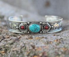 Turquoise Bracelet , Birthstone Bracelet , Bohemian Bracelet , Stone Bracelet , Cowboy Bracelet ,Southwestern Bracelet , Hippie Bracelet, Cuff Bracelet The adjustable bracelet is made with reconstituted Turquoise Sold Individually Thank you for looking my listing. Follow me for weekly updates. Head directly to the rest of my shop here: Gypsygalaxyjewelry.etsy.com Southwestern Style Bangle Cuff Bracelet For Festivals, Nickel-free Bohemian Bangle Cuff Bracelet, Bohemian Nickel-free Bangle Cuff Bracelet, Bohemian Bangle Bracelets With Stones, Adjustable Southwestern Bracelets As Gift, Adjustable Southwestern Style Bracelets For Gifts, Adjustable Southwestern Style Bracelets As Gift, Bohemian Silver Bangle With Natural Stones, Silver Bohemian Bangle With Natural Stones