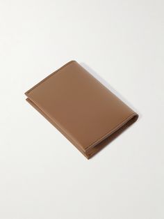 Acne Studios' no-frills wallet will serve you well for years to come. Made from pliable 'Camel' leather in a bifold design, it's fitted with four card slots and subtly gleams with silver lettering. Classic Cognac Bifold Card Holder, Classic Brown Trifold Card Holder, Classic Leather Trifold Wallet In Cognac, Classic Trifold Leather Wallet In Cognac, Classic Cognac Leather Trifold Wallet, Classic Trifold Card Holder With Smooth Grain, Brown Trifold Card Holder With Interior Slots, Brown Bifold Card Holder For Formal Use, Formal Brown Bifold Card Holder