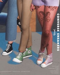 two people standing next to each other with tattoos on their legs and leggings