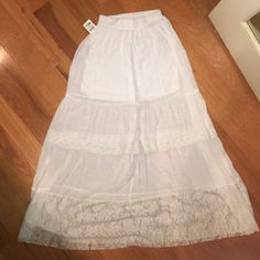 Beautiful White Maxi Skirt With Lace Detailing. Has A Mini Skirt Liner. Chic Spring Maxi Skirt With Lace Trim, Elegant Full Skirt Bottoms For Vacation, Elegant Full Skirt Bottoms For Beach, Stretch Skirt For Spring Beach Outing, Elegant Skirted Bottoms For Vacation, Elegant Vacation Skirted Bottoms, Elegant Full Skirt For Vacation, Spring Midi Skirt With Lace Trim, Summer Daywear Maxi Skirt With Lined Skirt