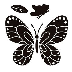 a black and white silhouette of a butterfly with leaves flying around it's wings