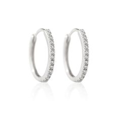 description These 14K Solid White Gold small hoop earrings are made with ethically sourced Real Diamonds end description materials 14K Solid White Gold Carat weight: 0.4cts Clarity: SI 1- 2 Hypoallergenic, lead and nickel free end materials details Thickness 1.4mm Inside Diameter 10mm Snap closure end details sku #ED013 end sku Small Diamond Hoop Earrings, Diamond Hoop Earrings Small, Gold Small Hoop Earrings, Classic Diamond Earrings, Diamond Earrings Wedding, White Gold Hoop Earrings, Diamond Jewelry Earrings, Silver Diamond Jewelry, Silver Diamond Earrings