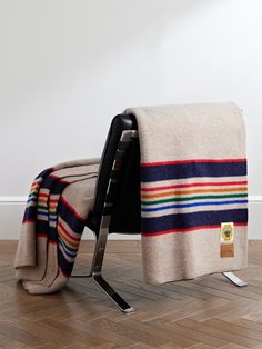 a chair with a blanket on top of it