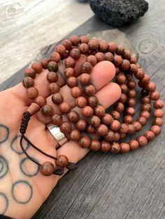 Unique and powerful Goldstone Japa mala Necklace from Nepal. A unisex piece that will be perfect for your day by day outfits and will be easy to match any other accessories. If it fits right can be a bracelet also. This is also a Buddhist praying 108 beads mala. The japa mala is 42.5cm- 16.75 inch long A unique addition to your jewelry collection. Enjoy Con salud Brown Spiritual Beads For Meditation, Spiritual Brown Beaded Bracelets, Spiritual Wooden Beaded Healing Bracelets, Spiritual Healing Brown Beads, Spiritual Round Beaded Bracelets For Festivals, Spiritual Wooden Beads Jewelry For Healing, 8mm Spiritual Beads For Meditation, Spiritual Beaded Bracelets, Spiritual Polished Beads For Meditation