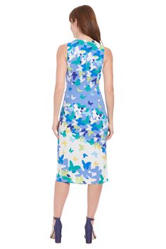 The London Times Brinleigh dress is a chic and versatile knee-length piece featuring a sleeveless design and a flattering tie waist. With its modern silhouette and timeless details, this dress effortlessly blends comfort and style, making it a go-to choice for various occasions where you want to showcase both sophistication and a touch of contemporary flair. Mid-length Sleeveless Dress For Spring, Spring Sleeveless Midi Dress With Tie Waist, Sleeveless Dress With Tie Waist For Day Out, Spring Sleeveless Dress With Tie Waist, Blue Spring Midi Dress With Tie Waist, Sleeveless Dress With Tie Waist For Spring Workwear, Spring Sleeveless Tie Waist Work Dress, Blue Sleeveless Knee-length Dress For Spring, Sleeveless Midi Dress With Tie Waist For Vacation