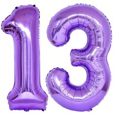 the number thirteen is made out of shiny purple foil balloons and sits in front of a white background