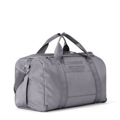 Meet our Monaco Garment Duffle Bag in grey: easy to use for traveling the world, attending weddings, and maintaining the work-gym balance. Shop our 2-in-1 bag. Gray Rectangular Travel Bag, Gray Travel Bag With Luggage Sleeve, Gray Rectangular Duffle Bag For Travel, Functional Duffle Bag For Business Trips, Functional Gray Travel Bag With Large Capacity, Gray Large Capacity Functional Gym Bag, Functional Everyday Gray Bags, Large Capacity Gray Gym Bag, Functional Large Capacity Gray Travel Bag