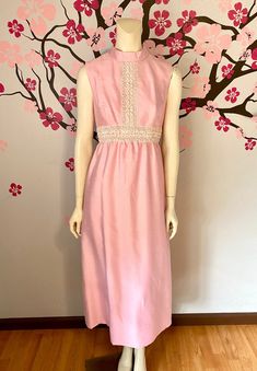 A beautiful 60's one of kind pink gown. Zips up the back. Fully lined. Looks to be hand sewn by someone back in the 60's. Its gorgeous! Classic style. Condition: Excellent-pre-owned, please see pictures. Lay flat measurements Shoulder to shoulder: 14 inches. Armpit to armpit: 17 inches. Waist: 14.5 inches. Hips: 22 inches. Length: 52 inches. Mahalo, Christina Pink Fitted Retro Maxi Dress, Retro Fitted Pink Maxi Dress, Pink Fitted A-line Vintage Dress, Vintage Pink Maxi Dress For Wedding, Pink Vintage Maxi Dress For Wedding, Spring Sleeveless Pink Vintage Dress, Pink Sleeveless Vintage Dress For Spring, Spring Vintage Sleeveless Pink Dress, Pink Sleeveless Dress For Vintage Fashion