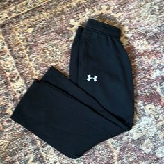 Never Worn! Washed And Sat In The Closet And Now Too Small For My Son:) Black Casual Under Armour Sweatpants, Under Armour Black Sweatpants For Sports, Under Armour Black Sweatpants With Pockets, Under Armour Casual Streetwear Pants, Sporty Cotton Pants By Under Armour, Under Armour Black Cotton Bottoms, Under Armour Black Pants With Pockets, Black Sporty Sweatpants By Under Armour, Under Armour Sweatpants