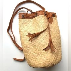 Brand New Bag! Super Cute With Any Outfit! Inner Brand Name Tag Marked To Prevent Store Returns Casual Tassel Bucket Bag, Camel Bucket Bag For Travel, Casual Travel Shoulder Bag With Tassels, Casual Shoulder Bag With Tassels For Travel, Beige Bucket Bag With Tassels For Daily Use, Casual Bucket Shoulder Bag With Tassels, Beige Tassel Bucket Bag For Daily Use, Casual Brown Shoulder Bag With Tassels, Natural Travel Bags With Tassels