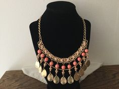 This is a OOAK Unmarked Necklace. It is a Choker Style with an Extension and Measures Approximately 20 inches from End to End. It has a Light Pink Criss Cross Leather on the Top of the Bead Row and the Beads are a Crackled Peach with small Beads below and Hanging Goldtone Pieces. The Hanging Part is about 2 1/2 inches including the Leather Section. It has a Claw Clasp and it is in Very Good Vintage Condition and Ready to Wear or give as a Gift. I just Love it and you will to!, Pink Beaded Chain Necklace, Pink Beaded Chain Necklace As Fashion Accessory, Necklace Leather, Small Beads, Choker Style, Choker Necklaces, Pearl Grey, Vintage Rhinestone, Gorgeous Necklaces