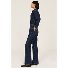 Blue denim (99% Cotton, 1% Lycra). Jumpsuit. Long sleeves. Collar. 55" from shoulder to hemline. 31" inseam. 11" rise. 16" leg opening. Imported. Fitted Long-sleeve Denim Jumpsuit, Fitted Cotton Denim Jumpsuit With Straight Leg, Fitted Straight Leg Cotton Denim Jumpsuit, Fitted Indigo Jeans For Work, Fitted Full-length Denim Jumpsuit With Pockets, Fitted Medium Wash Denim Jumpsuit For Work, Fitted Cotton Denim Jumpsuit For Fall, Fitted Denim Blue Jumpsuit For Work, Denim Blue Fitted Straight Leg Jumpsuits And Rompers