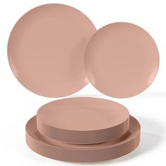 three pink plates stacked on top of each other in front of a white background,