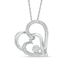 She'll adore the whimsical look of this beautiful tilted heart pendant. Created in sterling silver, this heart-within-a-heart design shimmers with diamond accents along both the larger and smaller outline. Nestled at the center, a diamond accent composite is artfully set to enhance size and sparkle. Buffed to a brilliant luster, this pendant suspends slightly askew along an 18.0-inch rope chain that secures with a spring-ring clasp. White Double Heart Diamond Necklace, White Diamond Double Heart Necklace, White Double Heart Diamond Accent Necklace, Double Heart Necklace With Diamond Accents For Anniversary, Diamond Double Heart Necklace With Heart Charm, Diamond White Sterling Silver Heart Necklace For Valentine's Day, Valentine's Day Heart Necklace With Diamond Accents, Valentine's Day Double Heart Diamond Cut Necklace, Silver Heart Necklace With Diamond Accents