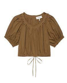 A suntan-colored, short-sleeved blouse called The Hills Top by THE GREAT, featuring a ruched neckline, puff sleeves, and a drawstring tie at the hem. Chic Cropped Short Sleeve Top For Spring, Classic Americana, Front Tuck, Sun Tan, The Hills, Puff Sleeves, Cool Girl, Puff Sleeve, Stitching