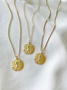 **Each piece in my shop, I personally create and photograph. (All photos are property of The Cord Gallery LLC) Thank you for supporting my small business. These stunning Medallion Necklaces are perfect stand alone and layering pieces. Features a Sand Dollar Coin Medallion with lots of rustic texture and interest. Made from Matte Gold Vermeil (18k Gold plated over 925 Sterling Silver).*Pendants measure 18mm in diameter (including bail)Hangs on your choice of chain:*14k Gold Filled Link Chain *14k Gold Jewelry With Lobster Clasp For Birthday, Spiritual Box Chain Necklace Gift, Spiritual Box Chain Necklace As Gift, Gold Charm Necklaces With Box Chain For Gifts, Gold Medallion Jewelry Gift For Mom, Gold Charm Necklace With Box Chain For Gifts, Gold Charm Necklace With Box Chain As Gift, Gold Medallion Jewelry As Gift For Mom, Gold Medallion Jewelry For Mom