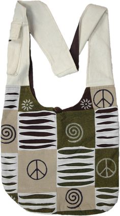 A statement hippie cross-body bag made up of canvas cotton fabric squares in olive green with peace, floral, and sun block prints.  The bag also features alternative razor cut details through cotton strips; the back is olive color dari fabric. #tlb #bohemianfashion #Handmade #BohemianBag #CrossBodyBag #Handmadehandbag Green Cotton Patchwork Bag, Hippie Cotton Shoulder Bag For Travel, Hippie Style Cotton Bags For Everyday, Hippie Cotton Shoulder Bag For Daily Use, Hippie Cotton Bags For Everyday Use, Bohemian Handbags, Crossbody Bag Pattern, Bohemian Bag, Hippie Aesthetic