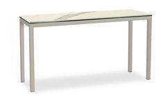 a white marble top table with silver legs