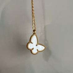 A product that will leave you with a butterfly effect. Designed with love. ♥ The product is produced in silver. Gold plated on silver. The product is manufactured with first class quality.The product is 18K quality silver plated. ♥ Chain length: 45cm. It is the ideal size. We have 16-18-20 inch chain options. ♥ The product size is around 23x19 mm. ♥ The product is 925 silver. ♥  Gemstone White  Ceramic Luxury White Necklaces With Polished Finish, Luxury Sterling Silver Butterfly Necklace, Luxury White Flower Pendant Jewelry, Delicate Butterfly White Gold Jewelry, Delicate White Gold Butterfly Jewelry, Elegant Sterling Silver Butterfly Necklace, Luxury White Gold Butterfly Pendant Necklace, Elegant White Necklace With Polished Finish, Elegant White Gold Jewelry With Butterfly Charm