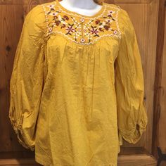 Max Studios Blouse Boho Peasant Style Embroidered Front Bubble Sleeve Elastic Wrist Size Large Pit To Pit Approx. 22” New With Tags B6 Peasant Style Embroidered Top For Beach, Spring Folk Tunic Peasant Top, Spring Folk Peasant Tunic Top, Spring Folk Style Peasant Tunic Top, Yellow Tops With Chikankari Embroidery For Spring, Yellow Chikankari Embroidery Top For Spring, Peasant Long Sleeve Embroidered Top For Beach, Bohemian Yellow Blouse With Floral Embroidery, Folk Style Embroidered Tunic Top For Spring