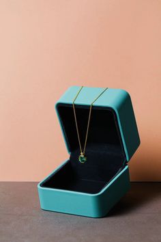 Experience luxury with our top-quality Colombian Emerald Necklace, complete with a GRC certificate for authenticity. Key Features: Main Gemstone: 1.2 CT Lab-Created Colombian Emerald (6*7 mm) Side Gemstone: 2.25 mm Natural Zircon Chain Material: S925 Silver Plated with 18K Yellow Gold Chain Length: 38cm Crafted to perfection, this necklace showcases a 1.2 CT lab-created Colombian emerald measuring 6*7 mm, certified by GRC for quality and authenticity. The addition of 2.25 mm natural zircon accentuates its beauty. The chain, made of S925 silver and adorned with 18K yellow gold plating, adds a touch of elegance to this exquisite piece. Elevate any occasion with the allure of our Colombian Emerald Necklace, a testament to sophistication and luxury." Pairing earrings link:https://www.etsy.com/ Elegant Rectangular Emerald Necklace As Gift, Rectangular Emerald Necklace Fine Jewelry Gift, Modern Jewelry With Vs Clarity As A Gift, Modern Jewelry Gift With Vs Clarity, Modern Jewelry Gifts With Vs Clarity, Gift Emerald Necklace That Is Tarnish Resistant, Gift Emerald Necklace Tarnish Resistant, Modern Jewelry As A Gift With Vs Clarity, Tarnish Resistant Emerald Necklace Gift