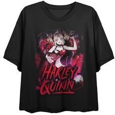 Celebrate your favorite comic book characters in style with this Harley Quinn crop t-shirt. The shirt features an illustration of Harley Quinn holding a thorny heart in front of a red and purple background while red letters spell out her name. The tee comes in a black short sleeve crop top. Fans of the Harley Quinn comics will love this comfy crop tee. Harley Quinn Clothes, Thorns Art, Harley Quinn Shirt, Harley Quinn Comic, Red Letters, Vintage Harley, Purple Background, Short Sleeve Cropped Top, Comic Book Characters