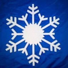 a white snowflake on a blue background