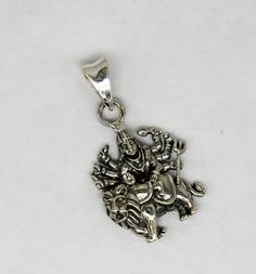 Indian Hindu Idols Blessing Goddess Bhawani/Durga/Santoshi maa with lion vintage antique style stunning divine pendant, best gifting unisex jewelry from India. Metal-925 sterling silver. Item type-Pendant Weight-5.020 grams. Height-3.7 centimeter. Width-2.0 centimeters. Stamped-925. Finish-Oxidized. note:chain is not included in this price Make excellent gifting and collectible pieces(gifts for birthdays, weddings, anniversaries, mother's day, fathers day, Christmas day,) We take absolute care o Spiritual White Gold Pendant Jewelry, Symbolic Silver Dangle Jewelry, Spiritual Engraved Pendant Jewelry, Spiritual Silver Dangle Jewelry, Spiritual Hallmarked Pendant Jewelry, Symbolic Pendant Jewelry For Festivals, Symbolic Pendant Locket Jewelry, Sterling Silver Spiritual Jewelry And Charms, Spiritual Sterling Silver Pendant Jewelry