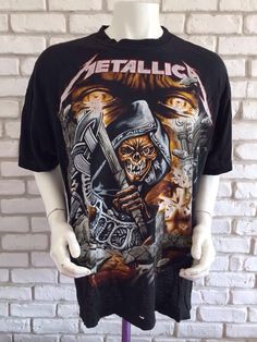 This is a great Metallica shirt from the early 90's The design is awesome, printed back and frontThere are a bunch of holes all over the shirt so please take a look at the picturesSize XL on tagPit to pit : 25,2 inchesTotal length: 28,35 inchesAs for all of my tee shirts, there's only one so take it or miss it :)Other model of Metallica shirt here : https://www.etsy.com/listing/547277108/metallica-1993-vintage-metallifukinca-t?ref=shop_home_active_3To enjoy exclusive updates on all our products, Band Merch T-shirt With Vintage Print For Streetwear, Vintage Cotton T-shirt With All Over Print, Vintage Halloween Concert T-shirt, Y2k Skull Print Streetwear T-shirt, Vintage Short Sleeve T-shirt With All Over Print, Band Merch All Over Print T-shirt For Streetwear, Band Merch T-shirt With All Over Print For Streetwear, Vintage All Over Print T-shirt For Streetwear, Vintage All Over Print Streetwear Tops