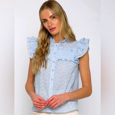 This Agnes Sleeveless Shirt Will Take You From Drab To Fab In An Eyelet! It Features A Button Down Front And Frilled Sleeves, Perfect For A Touch Of Street Style Drama. Be Sure To Let These Ruffles Do The Talking! Blue Sleeveless Buttoned Blouse, Sleeveless Blue Blouse With Buttons, Feminine Sleeveless Blue Blouse, Ivory Silk, Sleeveless Shirt, Mixing Fabrics, Central Park, Silk Blouse, Ruffles