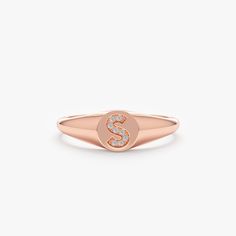 Sierra There’s nothing better than wearing your initials in diamonds! Get the letter of your choice on a signet ring. Personalize this ring for yourself or for your loved ones! - Handmade- Solid Gold- Natural Diamonds - G Color, SI Quality Diamonds- Dimension of the Ring: 6 mm- Total Diamond Carat Weight: .04 ctw All pieces come beautifully boxed in suede pouches you can always use (which really comes in handy when traveling!) Letter Ring, Name Rings, Pave Setting, Diamond Carat, Quality Diamonds, Signet Ring, Natural Diamonds, Solid Gold, Initials