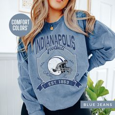 Root for the Indianapolis Colts in this Vintage Comfort Colors Colts Sweatshirt! With a retro 90's style, this oversized crewneck is perfect for women who want comfort and style for game day or casual wear. Makes a great gift for her or any Colts fan who loves a vintage boho look. 😃 ABOUT ME  😃 Welcome to my shop! Father of 2 beautiful girls and a beautiful wife. Born and raised in the crab capital of the world, "Maryland." The Laughing Duck was born out of a desire to create custom shirts tha Oversized Long Sleeve Throwback Tops, Oversized Throwback Top For Fall, Relaxed Fit Throwback Tops For Fall, Oversized Throwback Fall Tops, Fall Throwback T-shirt With Letter Print, Retro Relaxed Fit T-shirt, Oversized Retro Top For Game Day, Fall Throwback Letter Print T-shirt, Retro Oversized Tops For Game Day