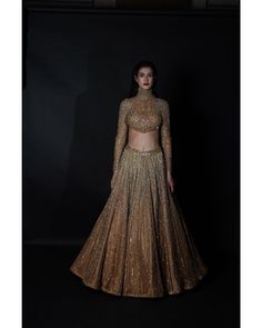 Ethereal Elegance: Bora Honey's Signature Indian Bridal Lehenga Designs for Timeless Weddings Luxury Gold Lehenga With Cutdana, Luxury Gold Lehenga With Traditional Patterns, Luxury Gold Choli For Designer Wear, Luxury Dola Silk Choli With Gold Embroidery, Luxury Long Sleeve Lehenga With Gold Embroidery, Luxury Gold Embroidered Dola Silk Choli, Luxury Gold Sequined Lehenga, Luxury Gold Velvet Lehenga, Luxury Gold Embroidered Lehenga For Navratri