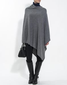 Asymmetric poncho in 100% pure cashmere. Elegant and warm for any occasion. The poncho embraces you softly and is available in 5 exclusive, timeless colours. Elegant One-size Cashmere Poncho, Elegant One-size Cape Poncho, Elegant One Size Cape Poncho, Elegant One-size Poncho For Layering, Elegant One Size Poncho For Layering, Elegant Oversized Poncho Cape, Elegant Oversized Cape Poncho, Elegant Batwing Sleeve Poncho For Fall, Elegant Long Sleeve One Size Poncho