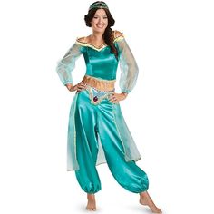 a woman in a blue costume is posing for the camera with her hands on her hips