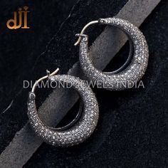 925 Silver Pave Diamond Huggie Hoop Earrings Fashion Jewelry EAMJOS-849 Pave Diamond Earrings. Diamond Silver Earrings. Silver Hoop Earrings.  Huggie Hoop Earrings.  925 Silver Diamond Earrings. Here Are Some Amazing Ways To Take Care Of Your Precious Diamond Jewelry. Always. * Apply lotion, cosmetics, hairspray, and perfume before dressing in jewelry. * When undressing, wipe each piece with a clean soft cloth to remove oils and perspiration. * Store in a fabric-lined box, separately or individu Sterling Silver Huggie Jewelry With Pave Setting, Fine Jewelry Hoop Earrings With Pave Setting, Silver Diamond Cut Huggie Jewelry, Sterling Silver Small Hoop Diamond Earrings For Anniversary, Silver Huggie Jewelry With Diamond Cut, Oval Sterling Silver Hoop Earrings With Diamond Cut, Dazzling Silver Round Huggie Earrings, Oval Diamond Cut Sterling Silver Hoop Earrings, Dazzling Silver Huggie Earrings