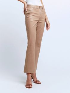 A high-rise cropped flare jean in a lustrous coated premium denim and a neutral cappuccino-beige hue. High-recovery denim hugs from waistband to knee before extending into a flared cropped leg finished with raw hem. Includes five-pocket construction and front zip fly closure. Brown Flare Jeans With Five Pockets, Chic Beige High-waist Flare Jeans, Chic High Waist Beige Flare Jeans, Beige Cropped Leg Jeans For Fall, Beige Cropped Jeans For Fall, Chic Beige Jeans With Five Pockets, Chic High Rise Beige Flare Jeans, Beige High Waist Flare Jeans For Fall, Spring Workwear Beige Flare Jeans