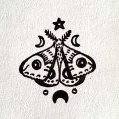 a drawing of a butterfly with stars on it's wings and eyes in the shape of a face