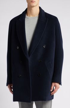 This double-breasted topcoat tailored from pure wool in a relaxed fit for ease of layering is sure to be a go-to essential season after season. Front button closure Notched lapels Four-button cuffs Front welt pockets Lined 100% wool Dry clean Imported Oversized Wool Pea Coat With Double-breasted Buttons, Modern Pea Coat With Lapel Collar And Double Button, Modern Wool Peacoat For Workwear, Modern Wool Peacoat For Work, Casual Wool Pea Coat For Office, Oversized Double-breasted Pea Coat For Business, Modern Business Pea Coat With Double-breasted Button, Modern Business Pea Coat With Double-breasted Fastening, Modern Double-breasted Wool Pea Coat