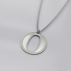 This silver initial letter necklace comes in either silver plating or sterling silver. This necklace is hypoallergenic and free from brass, nickel and lead. The pendant is 3/4in (20mm), with a 18in(48cm) chain and 2in(5cm) extension. For the sterling silver version, the charms & chains are solid 925 sterling silver. This is also an option to upgrade your sterling silver charm to a larger version of 1in. The initial is in Abhaya Libre Extrabold font and its outline is engraved to create a unique design Check out my other listings for other initials and designs. Please note that our necklace length image is a guide only. The necklace may sit lower or high depending on a person's build, height, age and neck size/width. Each person is different. Unlike stainless steel, sterling silver is prone Formal Sterling Silver Initial Pendant Necklace, Sterling Silver White Initial Pendant Necklace, Silver Hallmarked Initial Pendant Necklace, O Necklace Letter, Nickel-free Sterling Silver Initial Pendant Necklace, Letter O, Silver Chain Style, Letter Pendants, Letter Necklace